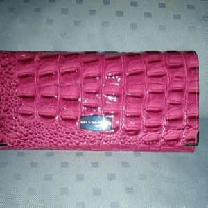 Newbridge cerise pink leather wallet.